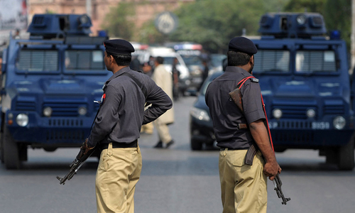 two-police-officers-approach-public-safety-body-against-their-abrupt-transfer