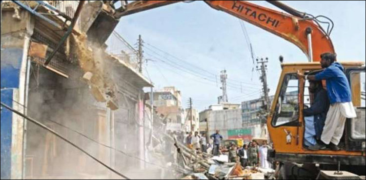 kmc-officials-demolish-several-shops-cabins-in-saddar