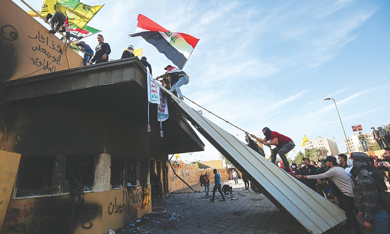 pro-iran-protesters-leave-us-embassy-in-baghdad