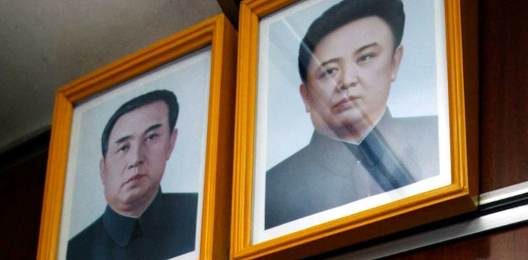 mother-faces-jail-for-saving-kids-from-fire-instead-of-the-dictators-portrait