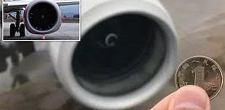 passenger-tossing-good-luck-coins-at-airplanes-engine-fined-heavily