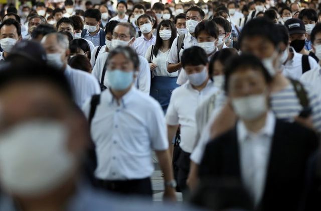 japan-will-only-hospitalise-most-serious-covid-19-cases-as-infections-surge